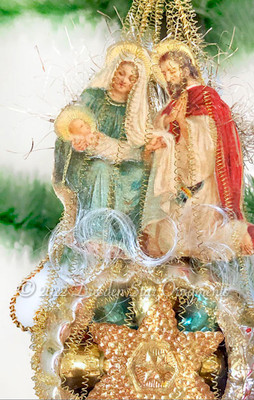 Mary, Baby Jesus and Joseph Nativity Scene on Amazing Glass Reflector Ornament with Gold Star