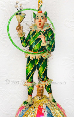 Juggling Scrap Clown with Glass Hoop while Balancing on Fancy Sphere Ornament 