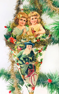 Santa Riding Bicycle and Twin Girls on Traditional Cornucopia with Village Night Scene