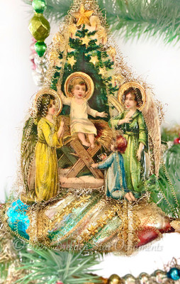 Nativity Scene with Baby Jesus and Christmas Tree on Multi-colored Rocket Ornament