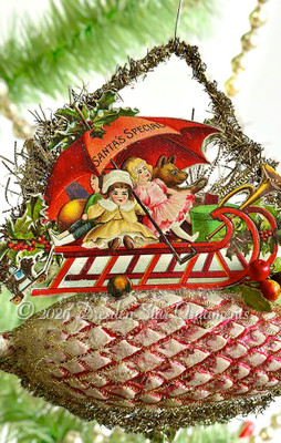 Large Red Frosted Pinecone with Sled Loaded with Presents from Santa