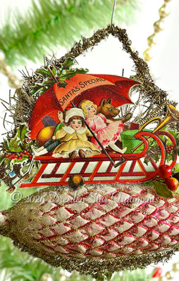 Large Red Frosted Pinecone with Sled Loaded with Presents from Santa