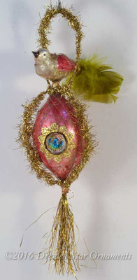 Bird perching on Rare Large Victorian Glass Bead with Gold Tinsel