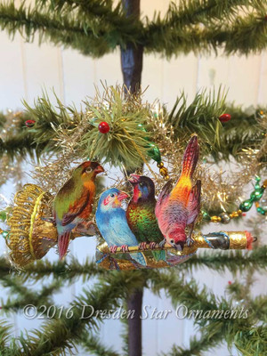 Four Birds Sitting on Elaborately Decorated Glass Horn Ornament