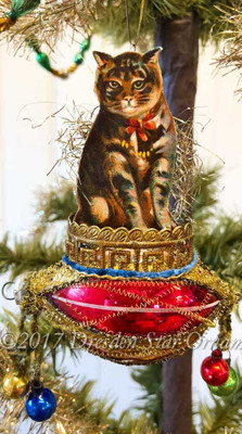 Calico Cat in Red and Gold Basket with Dangling Glass Balls