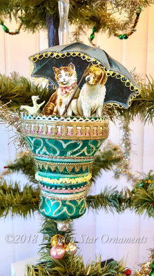 Reserved for Diana – Dog, Cat and Chick Trio with Umbrella on Beautiful Green Bell ornament
