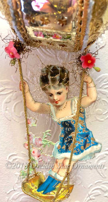 Fabulous Girl on Swing Hanging from Decorated Glass Ornament