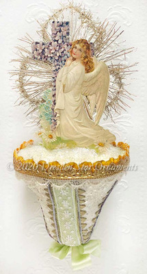 Easter Angel with Cross of Violets on Glittered Paper Bell Trimmed with Green Ribbon and Lace