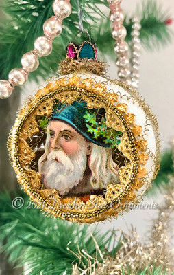 Santa with Blue Cap on Snowy White Indent Ornament 