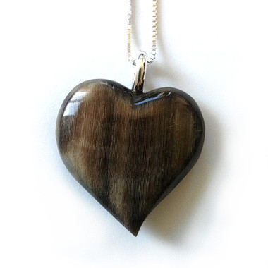 Dark horse hoof heart necklace.