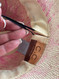 Adjustable head sizer tie