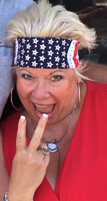 Bandana, American made flag loaded with Swarovski crystals, over 200 of them.  Red center in the stars surrounded by clear bling.  Check out all our stars and strips American Flag bandanas on line or swing on by our store in Red Wing, Minnesota