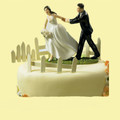 A Race to the Altar Couple Hand Painted Porcelain Wedding Cake Topper