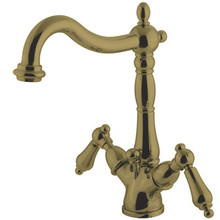 Kingston Brass Two Handle Mono Deck Two Handle Single Hole Lavatory Faucet with Brass Pop-Up Drain & Optional Deck Plate - Polished Brass