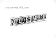 LAST ONE! This O'Keefe & Merritt vintage emblem badge mounts on the front stove control knob panel. the chrome is in very nice used condition. 

MEASUREMENT: Overall Length 3-1/8" / Underside peg distance 2-3/8"