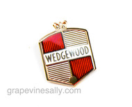 Original Vintage Wedgewood Gas Stove Red Logo Emblem. This Logo Emblem is found on the vintage 1940's - 1950's Wedgewood stoves - it attaches with 2 rear posts. It is in good used condition. It is a beautiful detail piece that attaches to the rear stove back splash and on some models and the front knob control panel. If you are restoring a vintage Wedgewood, you may want this beauty. Attaching nuts are included. 

MEASUREMENTS: 2.25" tall x 1.75" wide