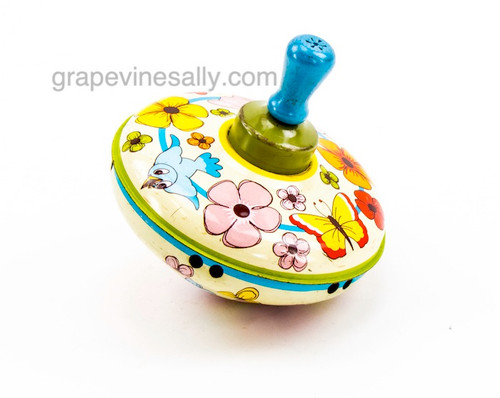 Vintage 1960's working spinning top tin toy. Great colorful graphics.
MEASUREMENT: 5.5" Diameter
