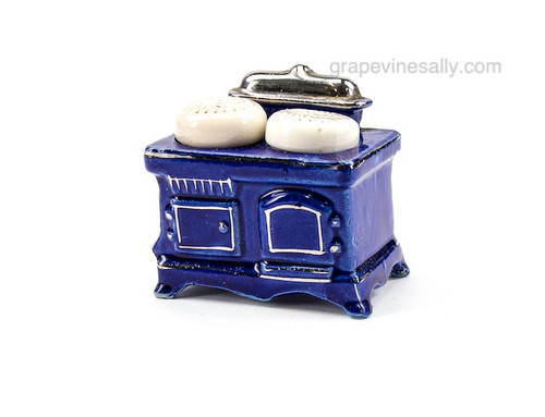 3 Piece Set - Blue Vintage Stove Salt & Pepper Shakers - This is a very cute set and would look great in any kitchen.
MEASUREMENTS:
Blue Stove W 2-3/8"  H 3.0"  D 2.0"
Each Shaker H 2.0" x Diameter 1-3/8"  