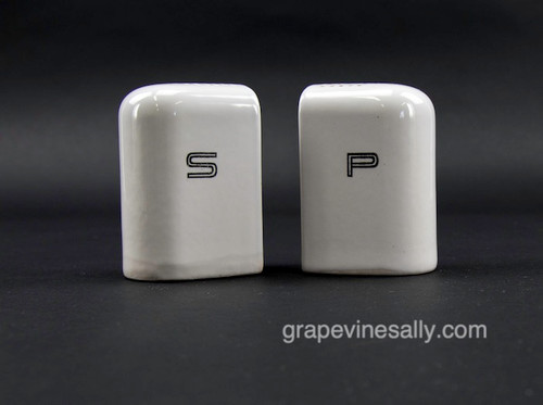 Original Vintage Gas Stove Top White Heavy Ceramic Salt & Pepper Shakers. Often found on the L&R side of the vintage stove top clock timer assembly. There are no cracks or stains. The 'S&P' lettering is in excellent condition. These shakers are in very nice used condition. Plugs included. 
 
MEASUREMENTS (each shaker) Width 2-1/2"  /  Depth 1-7/8"  /  Height 3-5/8"