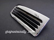 Vintage OKeefe & Merritt stove original NEW CHROME stove top vent. This is the OK&M style vent with the thin fins, with 1 center REAR PEG. Fits the vintage 1940's - 1950's O'Keefe & Merritt stoves.

MEASUREMENTS: 
Exterior Width: 6-1/8"  /  Exterior Depth: 2-1/2"

Backsplash Vent Hole Opening: 5-1/4" Width x 1-1/8" Depth