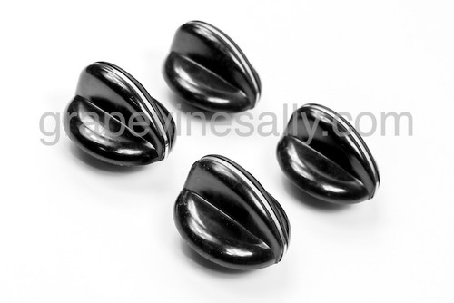 BUY 4 & SAVE 15%! NEW IN BAG 4 Black Stove Range Control Knob w/ 1/2" Stems. These are NEW reproductions with an extended 1/2" stem with rear "D" stems. These fit most vintage stoves with the standard "D" gas valve stem.

Also available in store with 1.0" stems.

MEASUREMENTS: Knob Diameter: 2.0"  Rear Stem Extends 1/2"