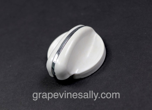SAVE OODLES! Please Read Full Description.

This is an original vintage O'Keefe & Merritt burner control knob. It is the style that works with the spring and separate chrome bezel. The rear 'D' had a crack, we have repair it. The repair is extremely solid. The exposed surfaces are bright and shiny and are absolutely gorgeous. Please be certain you are OK with this repair detail prior to making your purchase. 