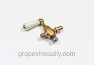 LIMITED SUPPLY - Vintage 1920's-30's Gas Stove Brass Burner Valve w/ White Ceramic Handle. This style burner valve was used by various period stove manufacturers. The white creramic handle is in very nice clean condition. There are no chips or cracks - the valve turns smoothly. The orifice caps are screwed down, they will need to be adjusted to the user's cooking preference. If you are not familiar with the fuel adjusting process we recommend that you contact a NG/LP professional in your area.