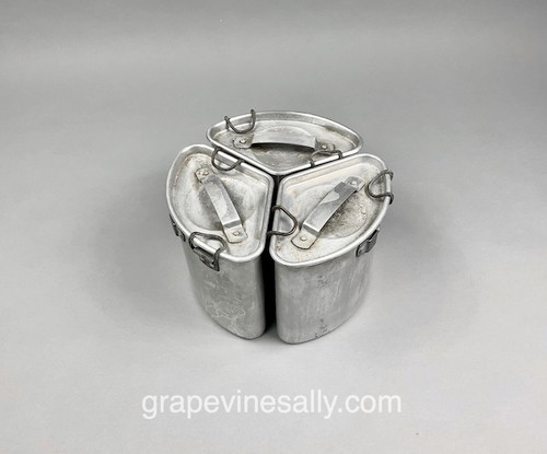 This is a very rare find.
Original Vintage Chambers Stove 3 Piece Soup Well Accessory. The metal integrity is solid throughout, no dents. All of the lids are in good shape and attach as intended. These were used with cooking and warming of a huge variety of culinary favs' - So many of the vintage Chambers stove features and accessories were ahead of their time. This is one of those creative accessories. Used in the soup well. These stoves continue to amaze! 

 More Chambers parts coming soon.