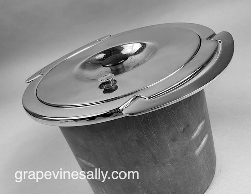 2 Piece Original Vintage Chambers Stove Large Thermowell Pot Accessory with the Pressure Release Lid with Handles. We have professionally polished the lid. The aluminum metal integrity is solid throughout. This was used with cooking and warming of a huge variety of culinary favs' - So many of the vintage Chambers stove features and accessories were ahead of their time. This is one of those accessories. Used in the soup well. These stoves continue to amaze!
 
BOTTOM DIAMETER: 8-1/4" / TOP EDGES DIAMETER: 10-3/8"
 
Only 1 available.
 
More Chambers parts coming soon.