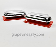 RED ROCKS!

A Set of TWO Vintage O'Keefe & Merritt stove used porcelain enameled and chrome vents. These were found on several early mid-40's Vintage O'Keefe & Merritt stoves. It is quite rare to find these in red. The chrome is not new chrome, however it looks like it has been recently re-chromed. 

MEASUREMENTS: Width 6-1/8"  /  Depth 2-1/2"