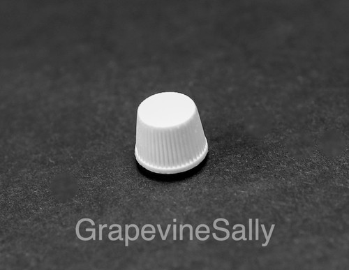 Hard to find vintage stove top Telechron clock knob. These are used on clocks and timers that were found on the 40's-50's vintage stove top clocks. The Telechron clock knobs use a reverse thread. THEY DO NOT PULL OFF as with the International clock, these knobs screw off and on. 