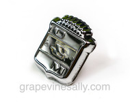 This is the O'Keefe & Merritt upper decorative back-splash/rear of clock trim emblem badge. Attaching nut included.