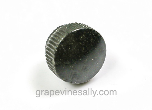 Hard to find vintage stove top black Telechron clock knob. These are used on clocks and timers that were found on the 40's-50's vintage stove top clocks. The Telechron clock knobs use a reverse thread. THEY DO NOT PULL OFF as with the International clock, these knobs screw off and on. The Telechron clock knobs are a very rare find.