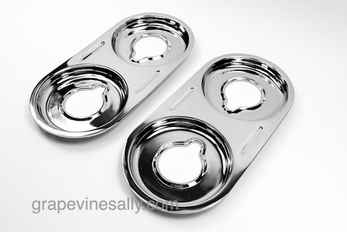 LAST SET! Original Vintage O'Keefe & Stove NEW CHROMED Stove Top Drip Tray Insets. This set is found on the early late 50's-early 60's O'Keefe & Merritt stoves. These are in 'like new' condition. The metal integrity is excellent. This is a gorgeous set.
 
All of our new chromed parts are 'Triple Plated' (copper, nickel, chrome)
 MEASUREMENTS: 
(Measured from the top side edges) Overall Length - 17-1/4" - Overall Width - 8-3/8"  -  WIDTH Inner Burner holes: 3.0"