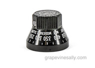 1930's Vintage Wedgewood Stove Robertshaw Oven Control Knob. No chips or cracks. Reconditioned/Relettered - Set Screw Included - Excellent like new condition.
 
MEASUREMENTS: Outer Lower Knob Diameter: 1-1/2"   
