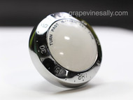 Original Vintage MAYTAG Stove Oven Timer Control Knob Dial. This oven knob was found on the late 1950's early 1960's vintage Maytag stoves. Their burner control knobs were mounted on the upper rear backsplash panel. This knob is in very nice bright and shiny 'like new' used condition.

MEASUREMENTS: Diameter 2-3/4"