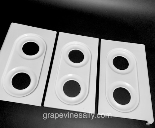 FULL SET of 3 Stove Tops - Fits the vintage 39" O'Keefe & Merritt 6 burner stove. This is a very nice used white used porcelain enamel stove top set for the vintage 6 burner O'Keefe & Merritt stove.
There is a some normal surface rust on the underside as with most used tops - the metal integrity is in excellent condition. We have touched up the PE in a few small areas, barely noticeable when the tops and grates are installed. The porcelain enamel is bright and shiny, all pieces have been thoroughly cleaned and polished - the two outer side panels will have the polished stainless trim installed with new screws and nuts. This is the only 6 burner complete set we have at this time in porcelain enamel. The last few photos show these tops with new porcelain enameled arrow 'cat ear' grates - the grates are for demonstration purposes only and are not included in this listing.
 
We do have a new chromed set available in the store. Please view the OM 'new chrome' sub-category. 
 
PANEL MEASUREMENTS:  
LEFT & RIGHT SIDES: Depth 22.0" / Depth at Corners 22-1/2" / Width 13-1/2"
CENTER PANEL: Depth 22.0 x Width 12.0"
 
PLEASE NOTICE: The drip wells are what we call the 'racetrack' style - this set accommodates both the thin & thick cast iron 'cat ear' arrow style & simmer grates.
 
Add a set of new PE grates (in the store) and you'll have a beautiful new looking stove.
 
Call with any questions - we're happy to help.
