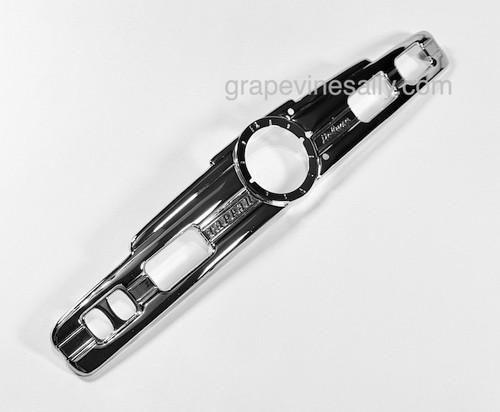 New chromed Tappan Deluxe clock, switch, dial trim plate. These are found on the upper backsplash panels. 

Width: 22-1/2"    -    Height at Center: 3-3/4"