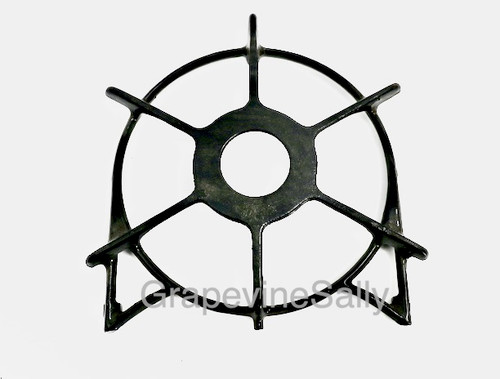 PLEASE READ FULL DESCRIPTION. This is a VERY WELL used original vintage O'Keefe & Merritt gas stove burner grate. This is the thinner cast style with 3 short pegs on the underside. Often found on the later 50's early 60's OK&M stoves including the built-in counter top drop-in OM stoves from the early 60's.

Our used grates & burners all have various degrees of wear and have been well used. No grates will be cracked. We give our used grates and used burners a light cleaning, (we won't sell greasy parts) however you may want to give them a bit more TLC. 

MEASUREMENTS: Outer Ring Width 8-3/8"  -  vertical measurement, to top of center spoke 9-3/4"
