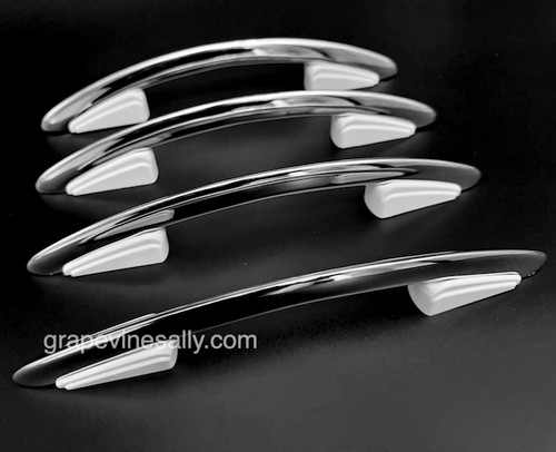 Set of 4 Original NEW CHROMED Vintage Western Holly Gas Stove 11" Oven Door & Drawer Handles. The white plastic/bakelite trim is bright white and shiny. In addition to the new chrome, these handles have been completely disassembled and reconditioned. Like new condition. Fits the vintage 1940's - 1950's Western Holly mid-century stoves. These handles are gorgeous.

EACH HANDLE MEASUREMENT:

Overall Length - 11.0" / Screw Mounting Holes - 5.5" (on center)

All of our new chromed parts are Triple Plated (copper, nickel, chrome).
