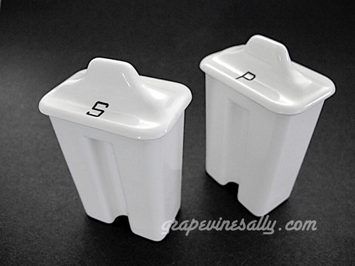 Original Vintage O'Keefe & Merritt Stove Top Clock/Timer Drop-In Salt & Pepper Shakers . This is an original OK&M stove top shaker set - both shakers have been reconditioned including new lettering, there are no chips or cracks. Plugs are not included. New cork plugs are included.
 Inserted Section Measurements: Width 2.0"  /  Depth 1-3/8""  /  Height 3.0"