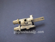 O'Keefe & Merritt, Wedgewood Original Gas Burner Control Valve. Our valves are all re-conditioned, the stem turns smoothly and the threads are in good condition. MEASUREMENTS: 2 Orifice Holes - 3/4" on center  /  Outside to Outside - 1-1/8"

THIS VALVE IS USED. Please note, we recommend you have a certified professional or company with experience in this area inspect these parts prior to installation. 