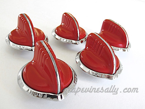 Full Set of Vintage RED Wedgewood Gas Stove Control Knobs. This style has the rear extended stem. This set has the aluminum lettered bezels - include 2 "FRONT", 2 "REAR" and 1 "GRID". These knobs fits the vintage 1940's-1950's Wedgewood gas stoves that utilize the extended stem knobs. 

There are no cracks, chips in the plastic/bakelite, all rear "D's" are in very good shape. All knobs have a brilliant shine, in excellent condition. These are all stunning and extremely rare. 

Supplies are extremely limited - Additional red extended sterm Wedgewood knobs are available without bezels for customers that prefer to add their model Wedgewood stove bezels or add the "BROIL" or "HEATER" bezels.

 