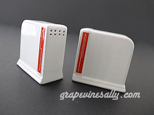 Two Used Vintage Deco Style White & Red Salt & Pepper Shakers. These are the heavy vintage ceramic salt & pepper shakers.
Original plugs included. This set is in very nice used condition. 
 
MEASUREMENTS (each shaker at base) Width (across front red lettering) 3.0"  /  Depth 1.50"  /  Height 3.0"