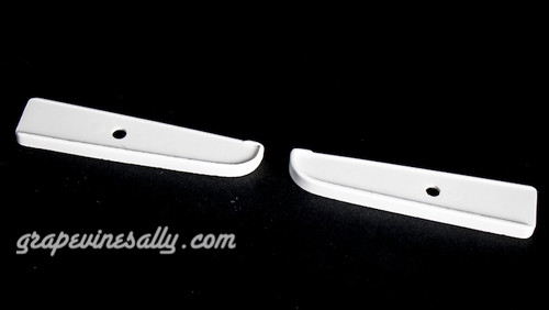 Set of two LEFT & RIGHT original 1940-1950's Vintage Classic Wedgewood Stove Oven Door Handle White Bakelite Trim. Bakelite handle trim 'shoes' - mount between handle and oven door. Bright and shiny ready to install.

PLEASE NOTE, these work with the smooth chrome handles - NOT THE RIBBED STYLE OF HANDLES.

The style with the 3 holes work with the ribbed style handles.
Also available.

MEASUREMENT: Overall length 4-1/8"