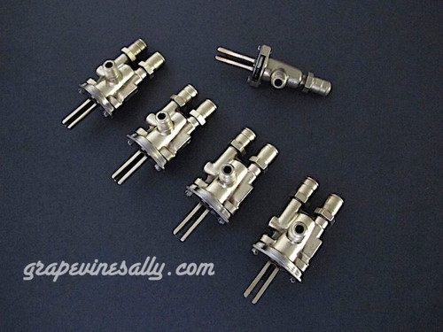 Set of 5 Original Vintage O'Keefe & Merritt, Wedgewood Gas Burner Control Valves. Set Includes: 4 gas burner valves + 1 center griddle valve.. Our valves are all re-greased, the stems turns smoothly and the threads are in good condition.

Please note: The orifice holes on this style burner valve are 3/4" apart, outer edges are 1.0"

THESE VALVES ARE USED - Please note, we recommend you have a certified technician or company with experience in this area inspect these parts prior to installation.