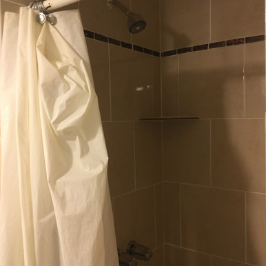 Ceramic tiled showers with easy entry