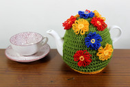 CMPATC090 Love Those Daisies Tea Cosy (4 Cup) decorated with brightly coloured daisies constructed on a daisy wheel