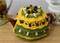 CMPATC094 Crocheted 2 cup tea pot cosy featuring bands of beaded broomstick crochet.