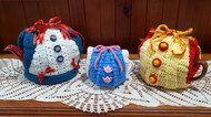 Image of Australian Craft Moods crochet pattern CMPATC113, Crocheted Roll-up Your Sleeves Tea Cosy, by Vicki Moodie.